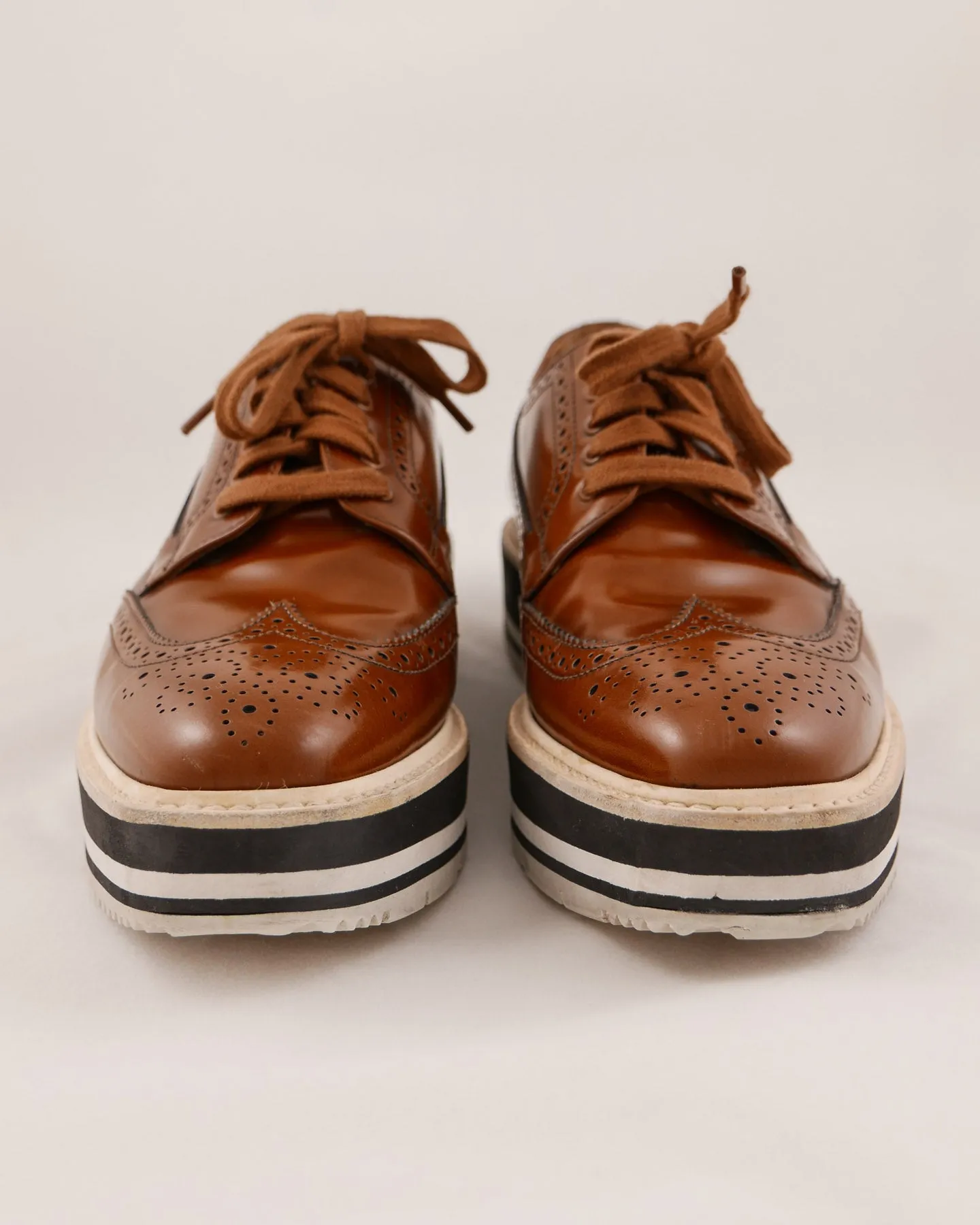 Prada Leather Wingtip Platform Shoes