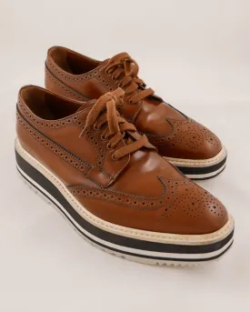 Prada Leather Wingtip Platform Shoes