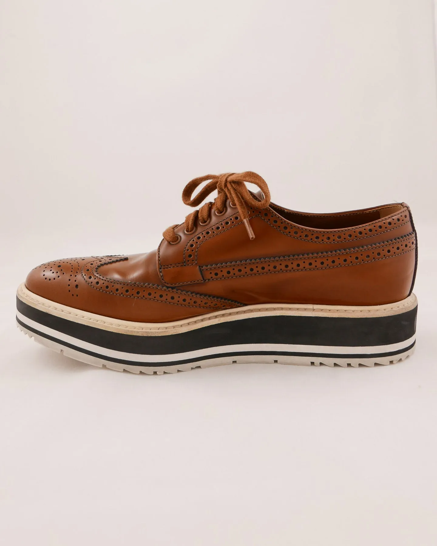 Prada Leather Wingtip Platform Shoes