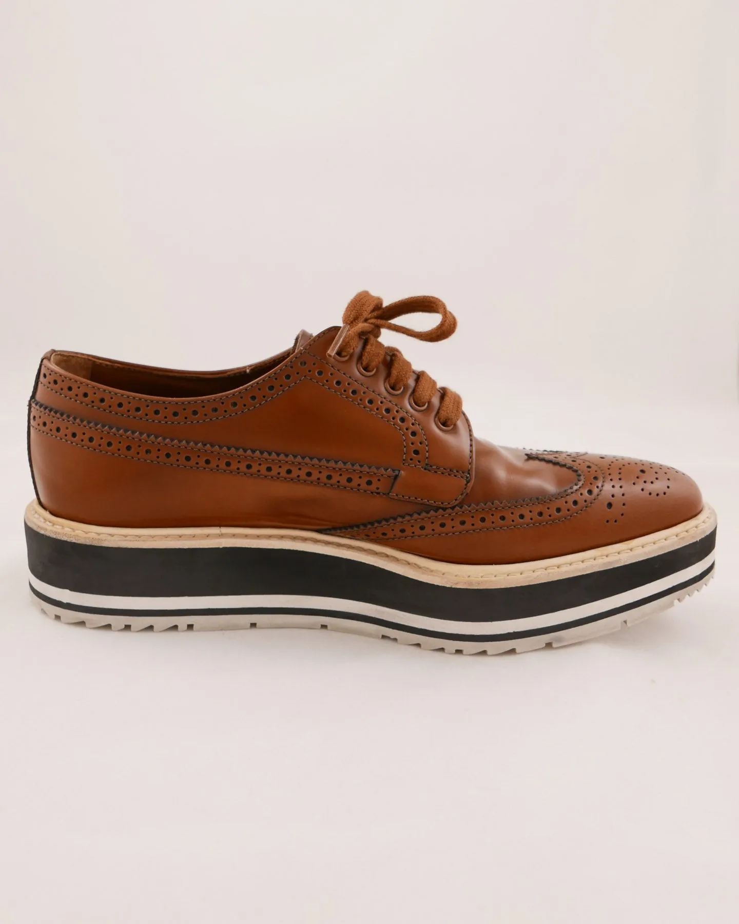 Prada Leather Wingtip Platform Shoes
