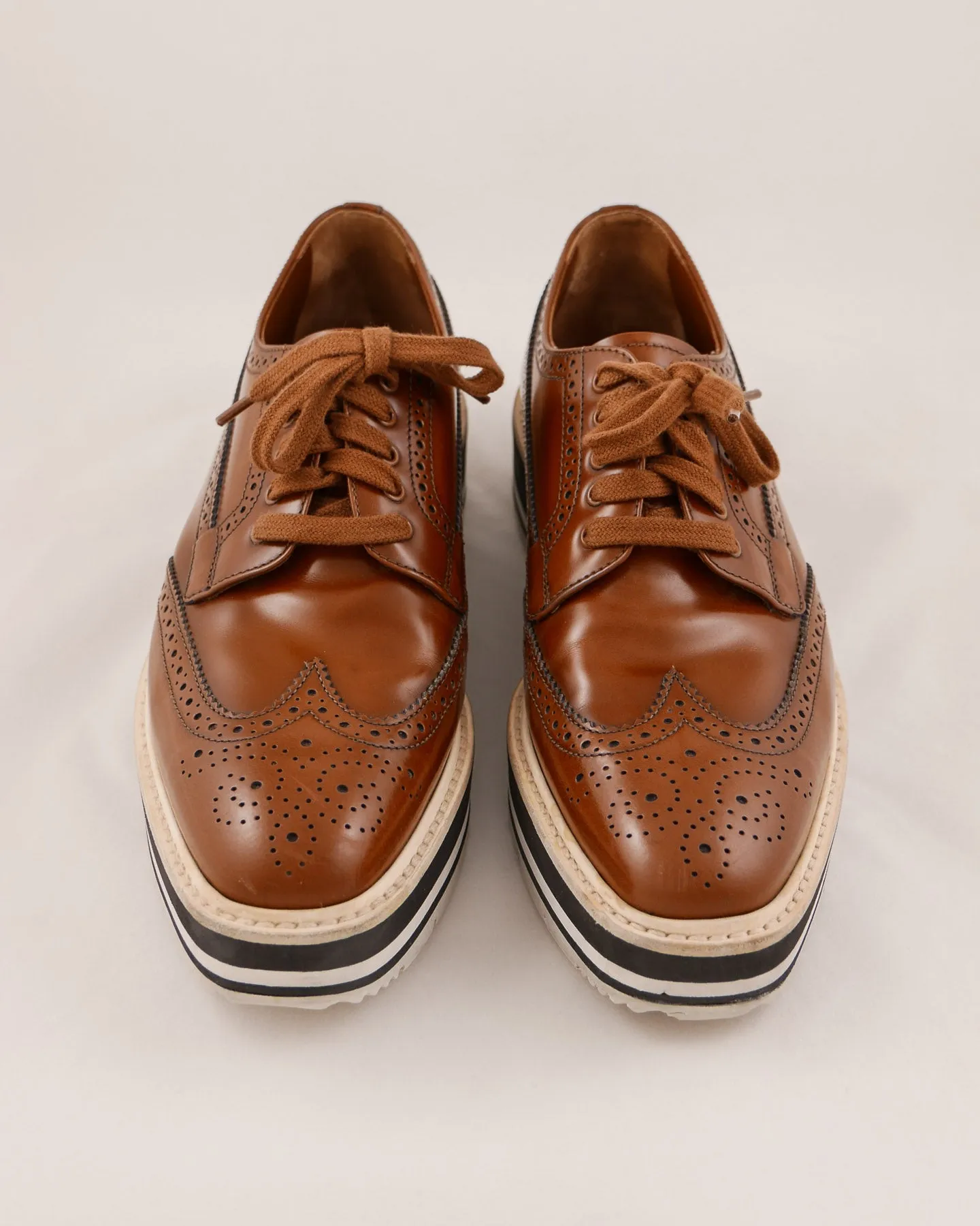 Prada Leather Wingtip Platform Shoes