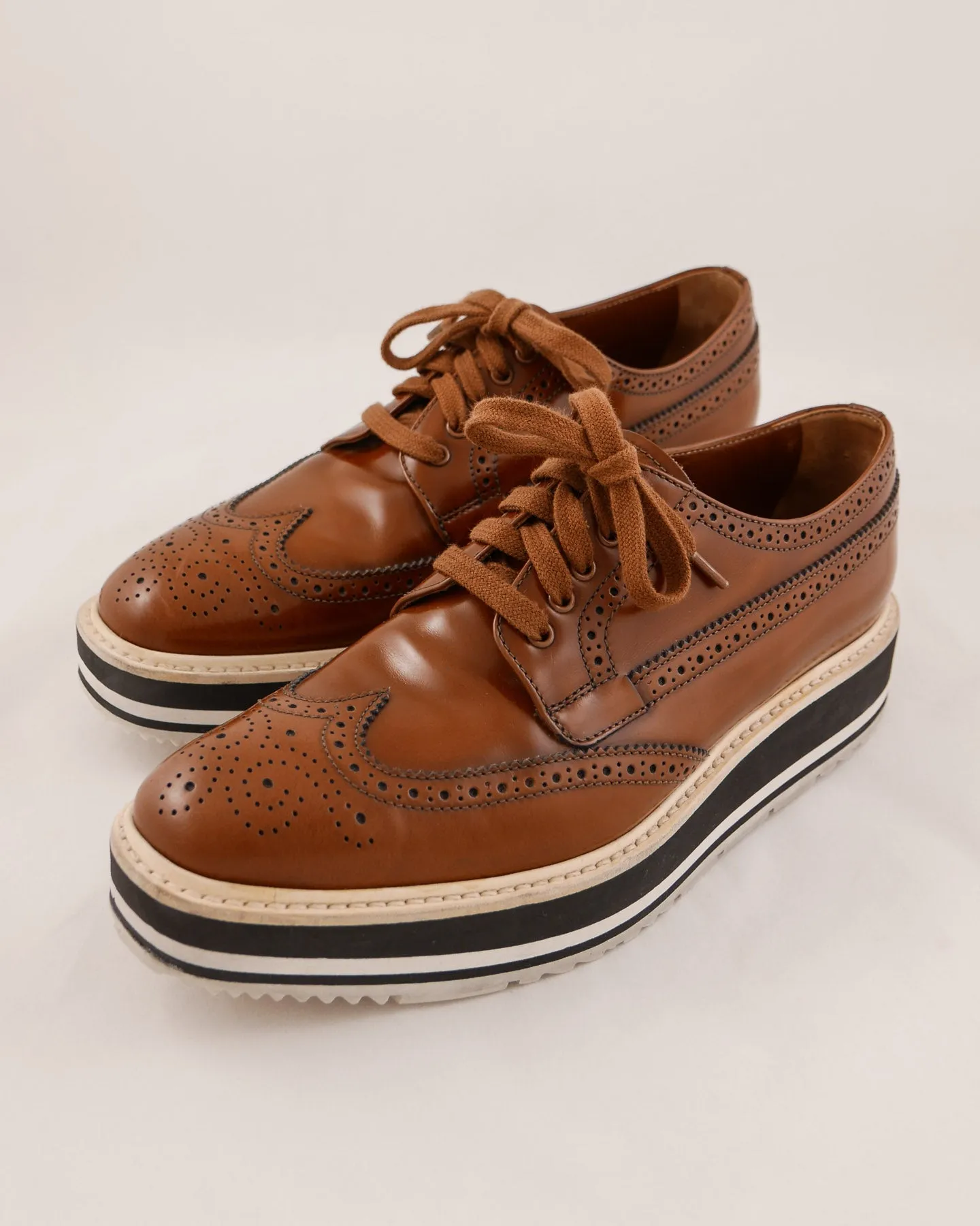 Prada Leather Wingtip Platform Shoes